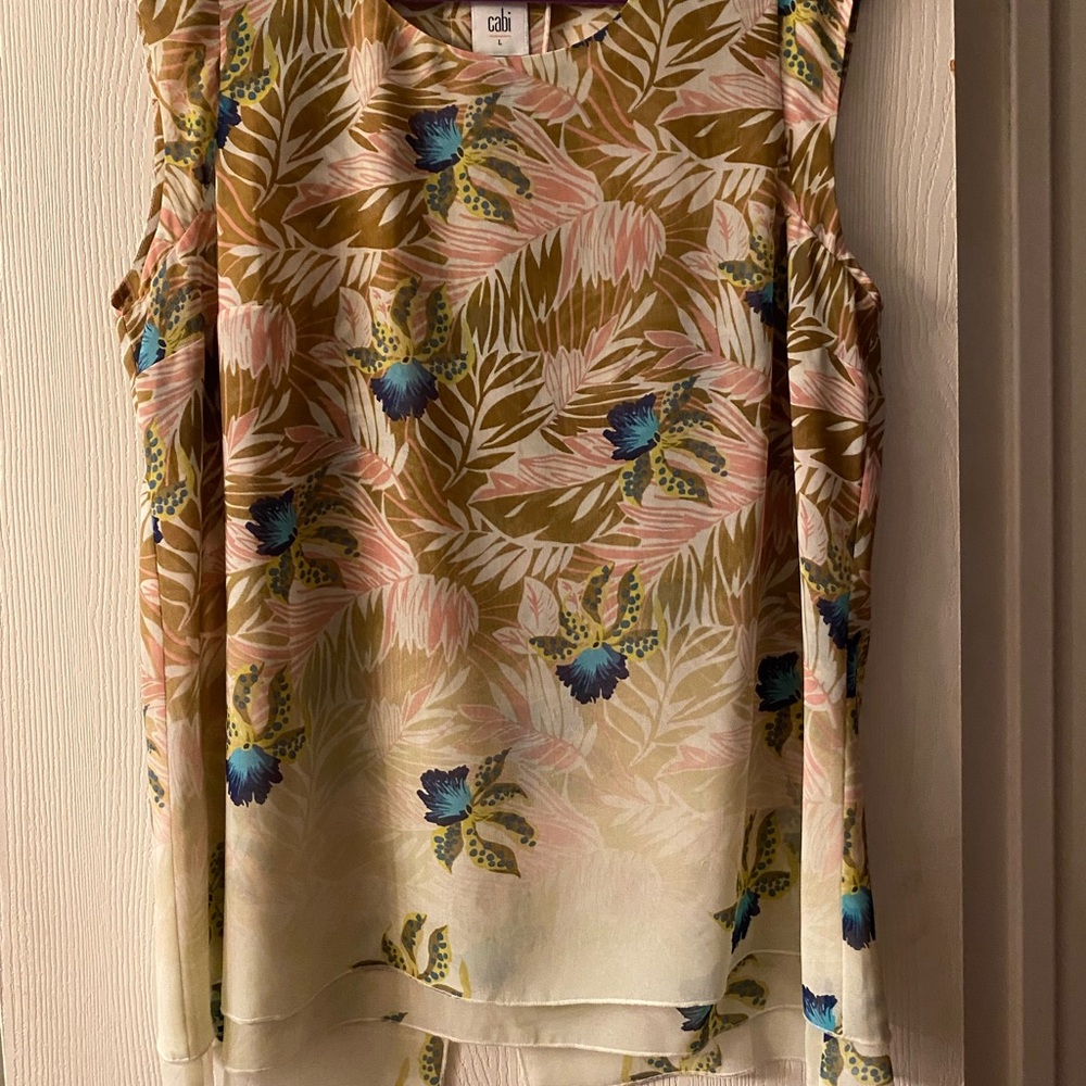 Cabi blouse with layered design.